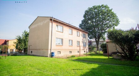 Prodej cihlového bytu o dispozici 3+1 v obci Vojnice u Olomouce.